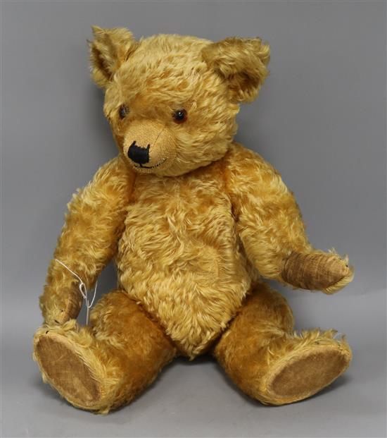 A golden mohair musical Teddy bear